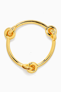 Kate Spade New York Interlock Bangle in Gold-tone Brass